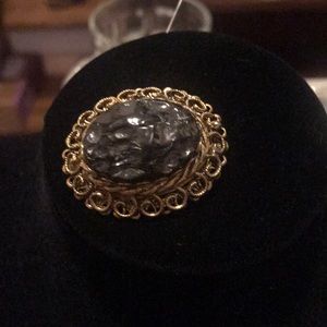 Vintage brooch with bold black stone